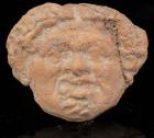 Greek Hellenistic Terracotta Antefix in the Form of a Gorgon head, Circa 3rd-1st Century B.C.E.