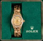 Lady's 18K Yellow Gold Rolex Date-Just Watch with 14K