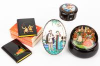 Russian Lacquer: Two Lacquer and Painted Covers on Small Notepads, One Russian Porcelain Music Box, One German Porcelain Box, On