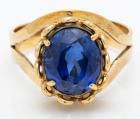 Lady's Pre-Owned, 18K Yellow Gold and Oval Violet-Blue Sapphire Ring