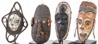 Fine Collection of 4 Various Sized Sepik River, Papua, New Guinea Hand Carved Wood Masks Decorated with Shells, Raffia and Organ