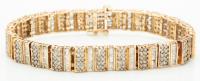 14K Yellow Gold and Diamond Link Bracelet, Approximately 4 Carats Total of Baguettes and Round Brilliant Cut Diamonds