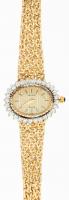 Lady's Classic 14K Yellow Gold and Diamond Watch by Geneve with Striking Horizontal Oval Face