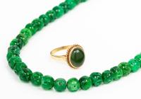 Ladies Intricately Carved Jade Bead Necklace on 14K Yellow Gold Chain with a Fine 14K Yellow Gold and Jade Cabochon Ring