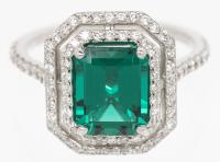 Lady's Platinum and Lab Grown Emerald and .50 Carats Diamond Ring