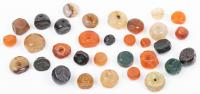 15 Sasanian Gem Stone Stamp Seals, a Mix of Carnelian, Obsidian, Agate, Rock Crystal and Hard Stone 3rd-7th Century AD