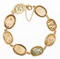 Eight Beautiful Ancient Egyptian Scarabs Set in 18K Yellow Gold Bezels Forming a Stunning Link Bracelet