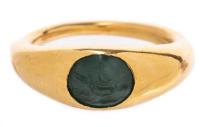 Beautiful, Modern 22K Yellow Gold Ring Centered with an Ancient Emerald Intaglio Carved with an Intriguing Figure with Arms Outs