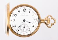 Lady's 14K Yellow Gold Pocket Watch by Lambert Bros. in 14K Yellow Gold and in Very Fine Working Condition.