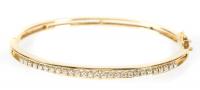 Lady's 14K Yellow Gold, Hinged Bangle Bracelet with 26 Accent Diamonds