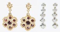 Two Pair of 18K Gold Post Earrings, One Pair Yellow Gold with Garnets, One Pair in White Gold with Diamonds.