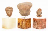 Three (3) Striking Pre-Columbian Terracotta Heads Well Presented on Onyx Bases.