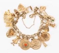 14K Yellow Gold Bracelet with 26 Charms also in 14K Gold. A Whopping 91.31 Grams