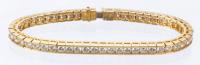 Beautiful Lady's Channel Set Diamond Bracelet in 14K Yellow Gold. 61 Diamonds Totaling Approximately 6Â½ Carats