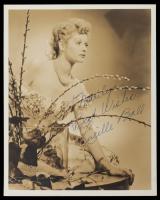 Lucille Ball: Beautiful Portrait by Ernest Bacharach for RKO Pictures. Sepia Double Weight Photo Inscribed and Signed