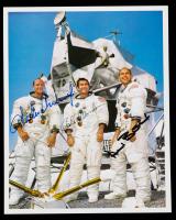 Apollo 12 Collection: Two (2) Crew Signed Lithographs: White Suits and Lunar Surface.