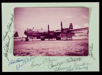 Rare Signed Piece by All 9 Members of the Enola Gay with Vintage Color Photo of the B-29 on Tinian Island Taken in September, 19