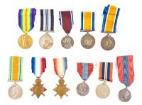 Twelve (12) British Merit and Service Medals Mostly WWI-WWII:Two George V War Medals, Two British WW1 1914 Star Medal Awarded