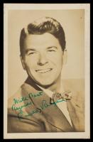 Ronald Reagan: Photo Postcard from the late 1930s Personally Autographed While a Young Actor Costing a Fan 10Â¢ LOA by James Spe