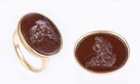 Outstanding Neoclassical Ring with Garnet Intaglio Exquisitely Carved Battle Scene set in a Simple, Custom, 18K Yellow Gold Moun