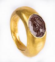 Handsome, Ancient, High Karat Yellow Gold Ring with a Carnelian Intaglio of a Bust of Hercules Facing Left