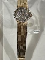 Ladies Vintage Baume & Mercier 14K Yellow Gold Diamond Faced Watch with a total of 1.25 Carats of Diamonds