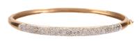 Ladies Hinged Bangle Bracelet in 14K Yellow and White Gold with a Medley of White Accent Diamonds