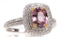 Ladies Lovely, Petite Dinner Ring with 1.55 Carat Pink Sapphire Set in Platinum within a Triple Tier of Accent Diamonds and on S