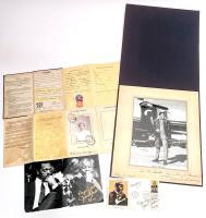 Three Pieces of Black Americana: Signed Photographs By James Brown and Jesse Jackson and a Jamaican Passport