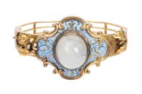 Remarkable, Antique Victorian 20 Karat Yellow Gold, Enamel and Exquisite Star Sapphire Cabochon Hinged Bangle Bracelet