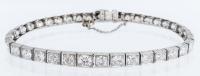 Exceptional Ladies Platinum and Diamond Antique Bracelet. Largest Diamond is the Center Stone with the Diamonds Graduating Lower