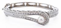 Classic Understated Elegance Defines Perfectly This 14K White Gold, Pearl and 2.5 Carat Diamond Hinged Bracelet