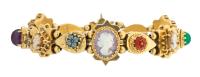 Ladies Antique 14K Yellow Gold Slide Bracelet Having Beautifully Crafted Individual Charms with Semi-Precious Stones and Miniatu