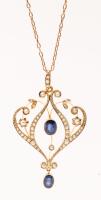 Lovely Victorian Revival Pendant in 14K Yellow Gold with Two Fine Sapphires and Seed Pearls in a Delicate Floral Motif.