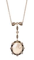 Unusual Antique Pendant Necklace with in 14K Yellow Gold and Sterling Silver Centered with a Lustrous Abalone Mabe Pearl and Dia