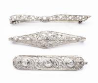 Three Antique 18K White Gold and Diamond Art Deco Pins, One Quite Exceptional.