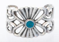 Handsome Sterling Silver and Turquoise Cuff with an Appealing Open Work Foliate Design