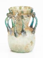 Remarkable Glass Thread Decorated Jar. Byzantine Period, 5-6th Century C.E. Superb Iridescence with Decorative Glass Ribs.