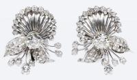 Glamorous Art Deco Diamond Clip Earrings in 14K White Gold. Nice Quality with Each Having a .90 Carat Old European Cut Diamon