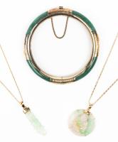 Two Jade Pendants each on 14K Yellow Gold Chains and a Hinged Jade Bracelet.