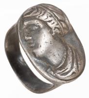 Silver Ring with Entire Top of Oval Having a Bust of a Woman of Wealth Facing Left with Head Wrap and Draped Collar and Shoulder
