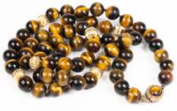 Striking Tiger's Eye Necklace of Exceptional Quality with 7 Large 14K Yellow Gold Fluted Beads