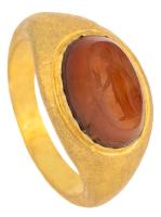 Striking, High Karat Yellow Gold Ring with Large Carnelian Intaglio of the Goddess Athena