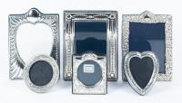 Six Sterling Silver Frames All Hallmarked 925 or Have the Lion Passant Mark
Three 5 x 7" Frames and Three Frames Holding Photos