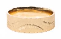 Ladies Elegant 14K Yellow Gold Hinged Bangle Bracelet with a Brushed Finish and Hand Engraved Fern Leaves Throughout