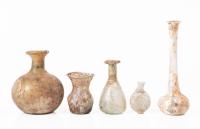 Collection of Five Roman Glass Vessels Including Tall Unguentarium and Miniature Flasks