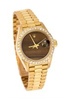 Exceptional Ladies 18K Yellow Gold Rolex Oyster Perpetual DateJust Chronometer with a Beautiful Tiger's Eye Face and Diamond Bez