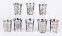 Eight (8) 19th Century 84 Zolotnik Silver Kiddush Cups Beautifully Engraved with Village Scenes or Extravagant Foliate Designs