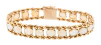 Beautiful Ladies 14K Yellow Gold Bracelet with 19 Opals Having Great Fire. 9.5 Carats of Opals