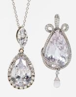 Two Dazzling Near Colorless Topaz Tear Drops set In Sterling Silver and One Sterling Silver
